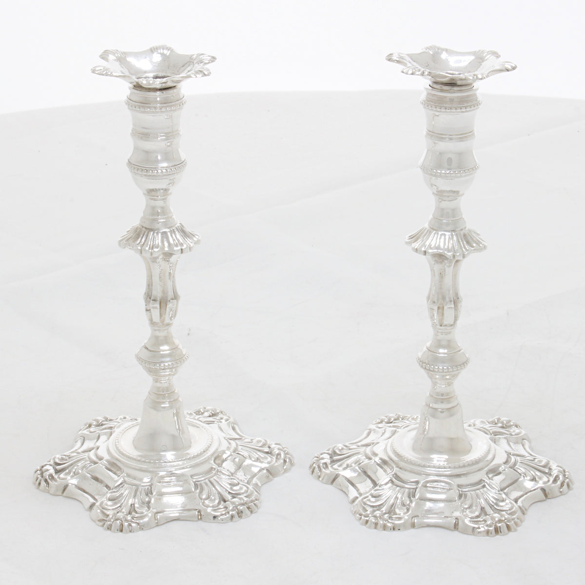 Nice pair of cast silver tapersticks 1969