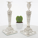 2 hoge zilveren kandelaars