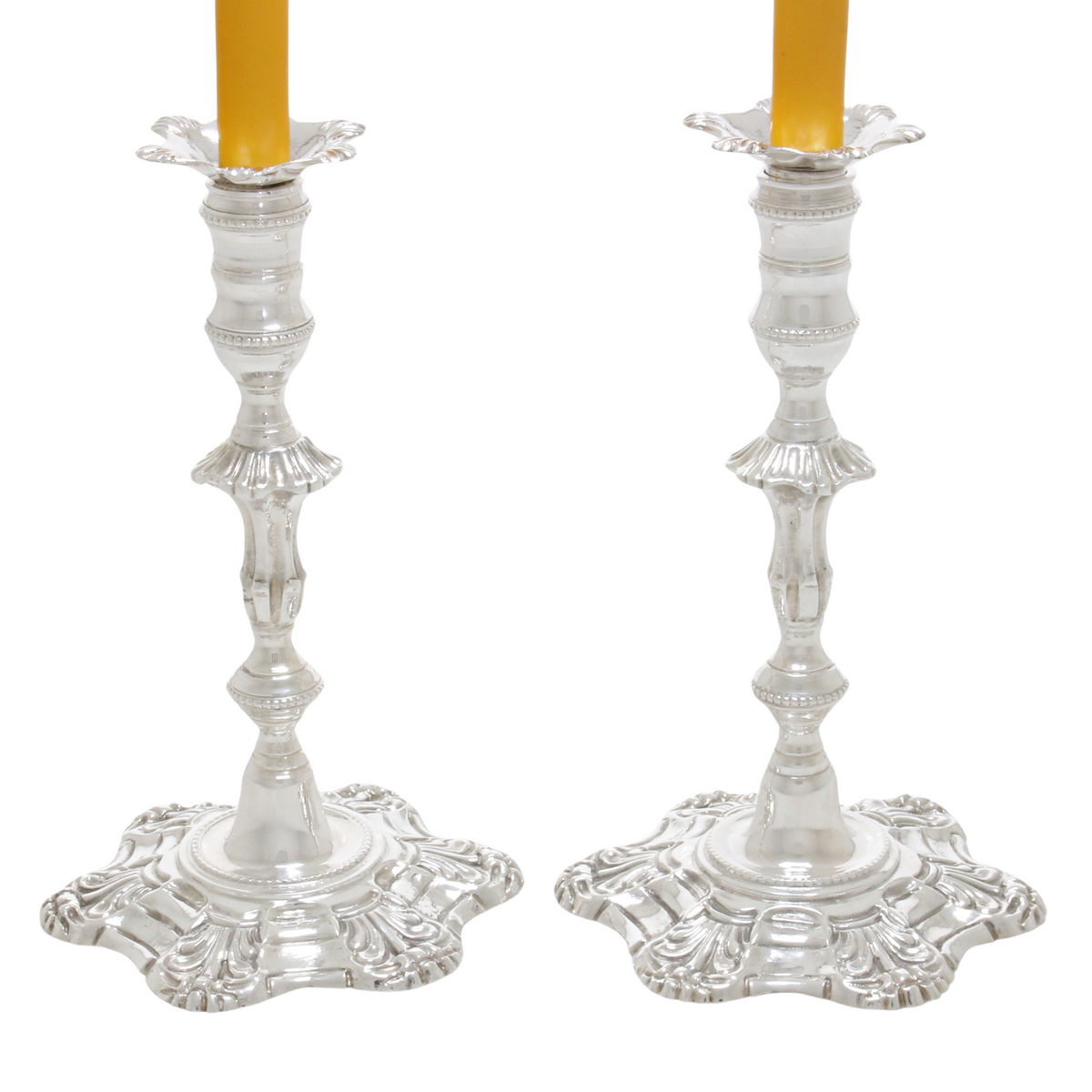 Nice pair of cast silver tapersticks 1969