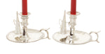 Antique silver chambersticks sold by Christies