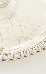 Familie wapen op zilveren blaker