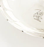 Familiewapen gegraveerd op zilver op andere blaker