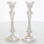 Large silver candlesticks