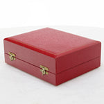 Originele rode doos voor kleine kandelaars van zilver