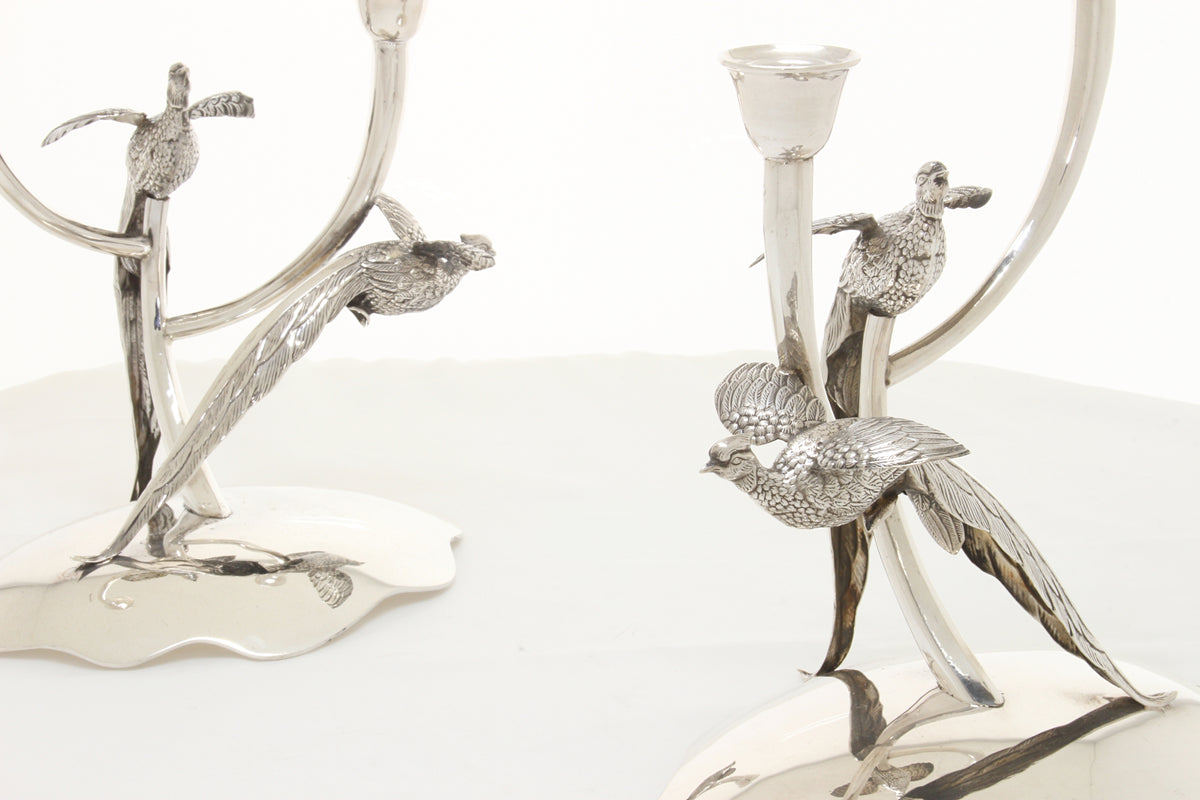 Silver candlesticks from Spain with peacocks .915