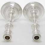 Zilveren kaars houders liggend voorzijde. Gemaakt door William Comyns.