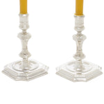 Zilveren kleine kaarshouders met gouden kaarsen