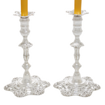 Zilveren wax verzegelaar met gele kaarsen